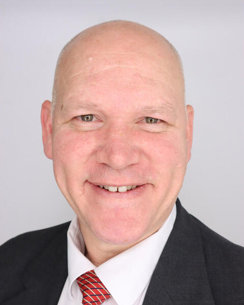 Mark E. Morrey
