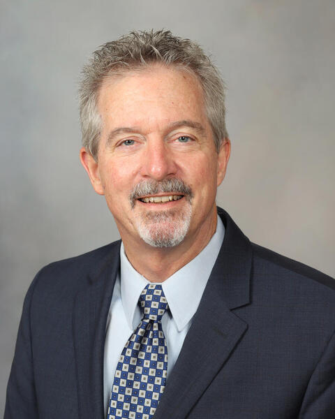 Tom D. Thacher