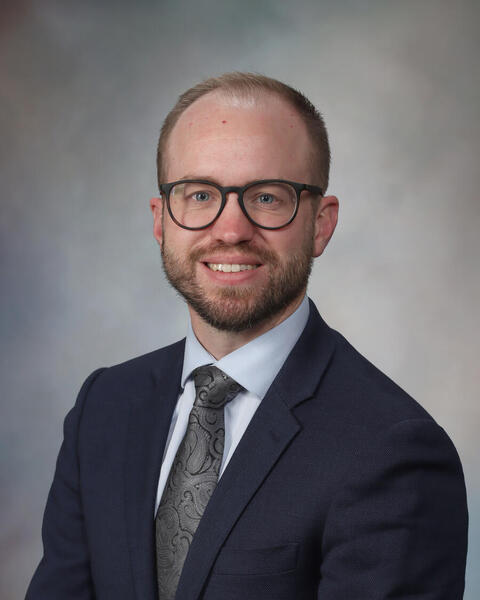 Adam M. Kase